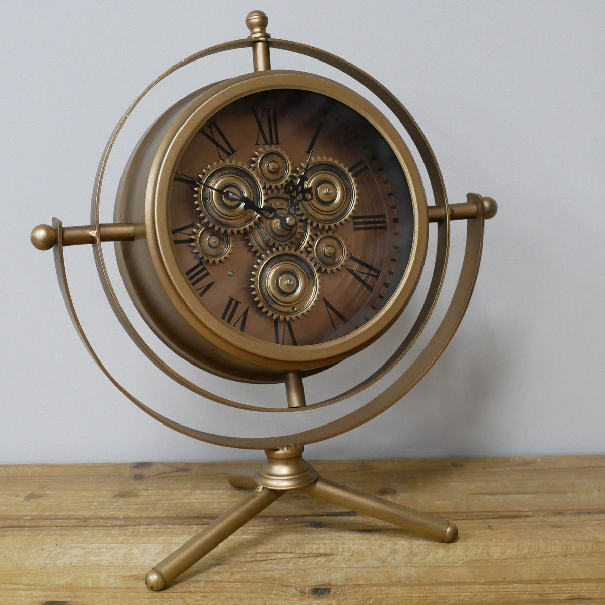 Small gold gyroscope working cog mantel clock