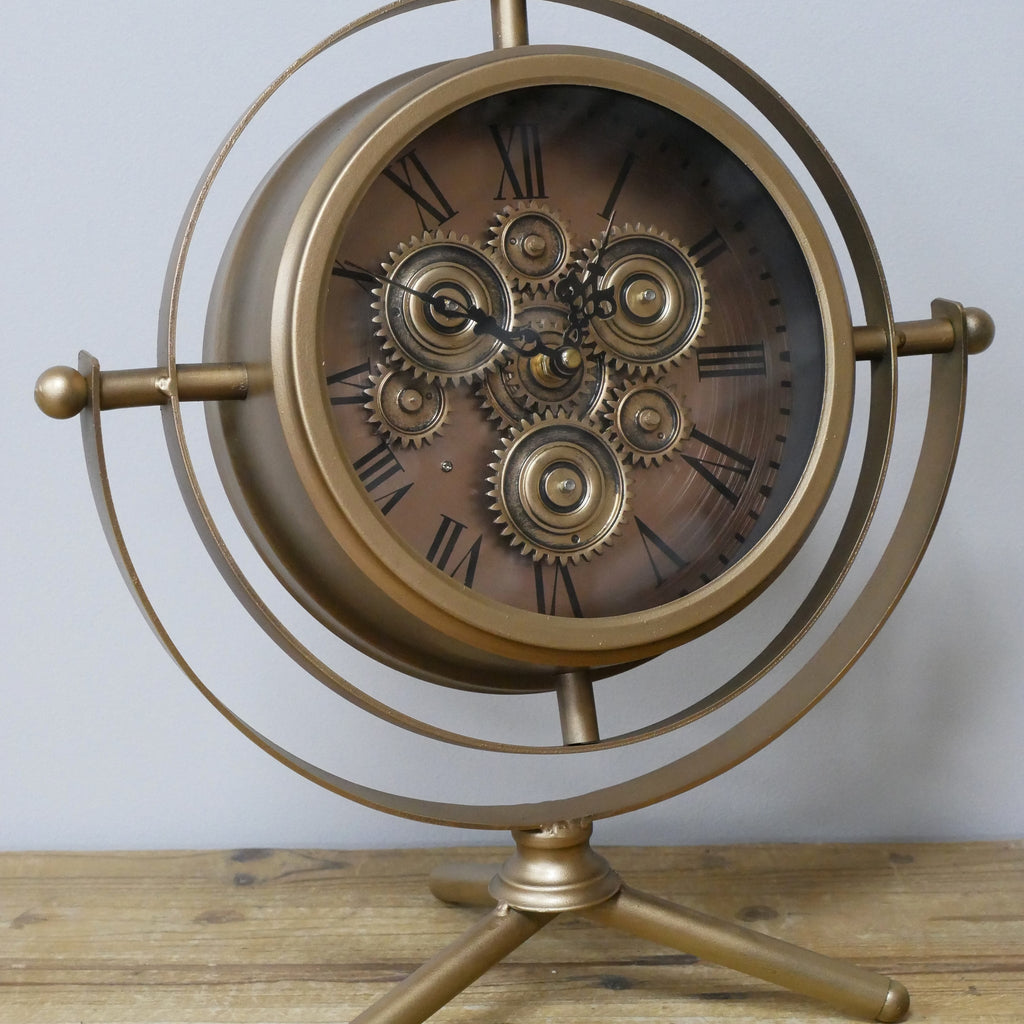 Small gold gyroscope working cog mantel clock