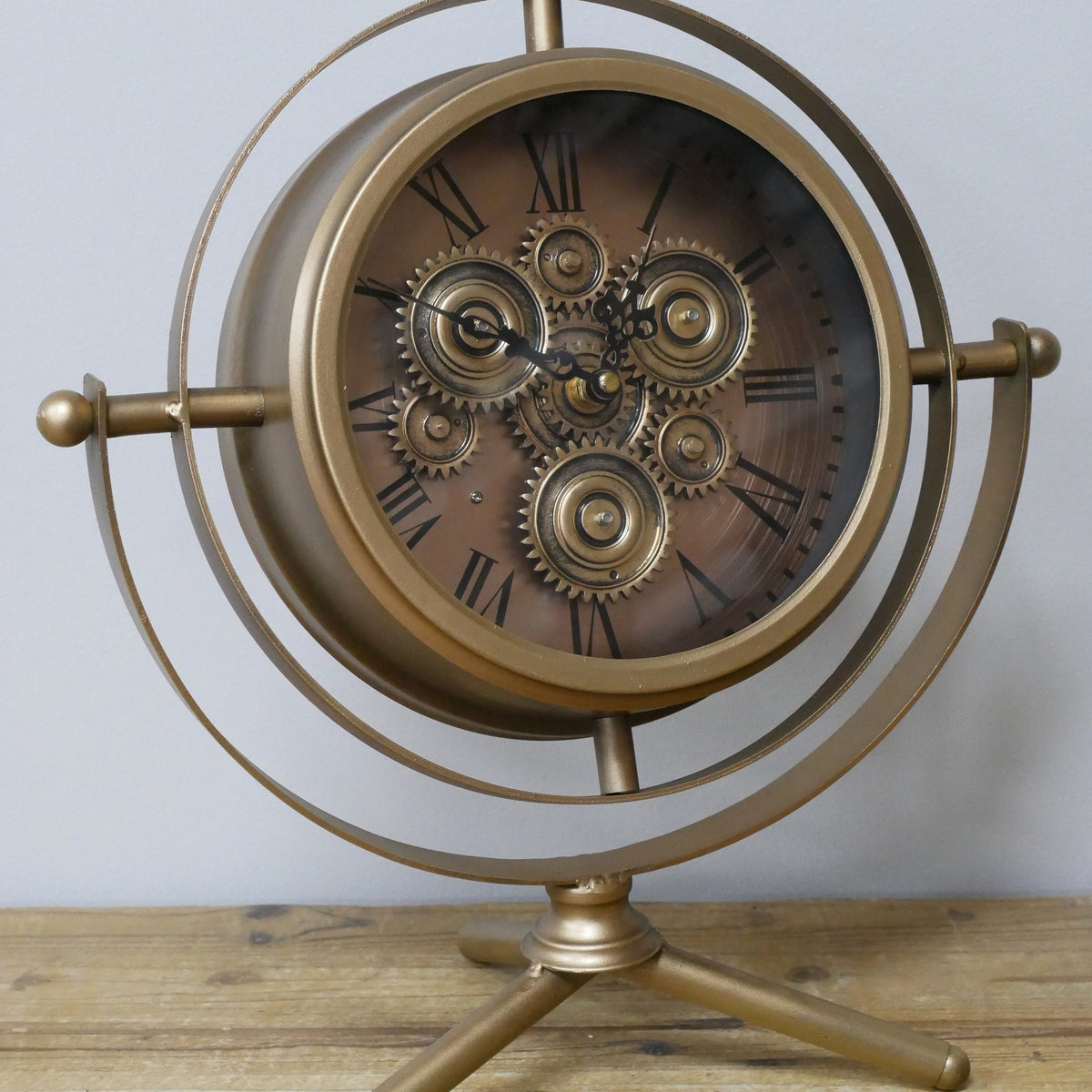 Small gold gyroscope working cog mantel clock
