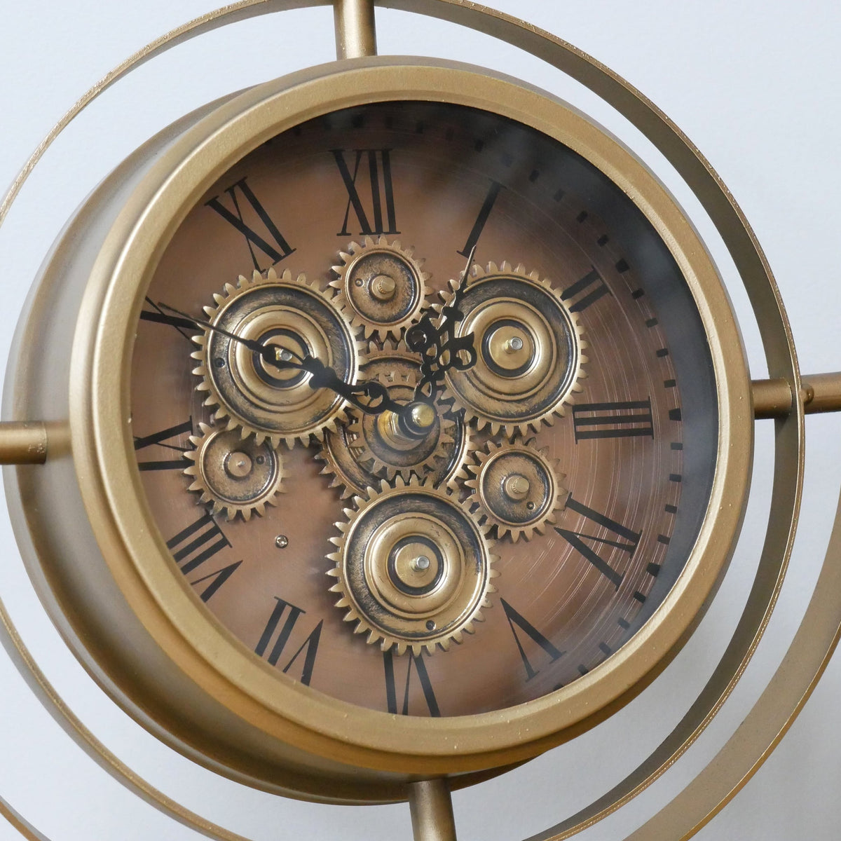 Small gold gyroscope working cog mantel clock