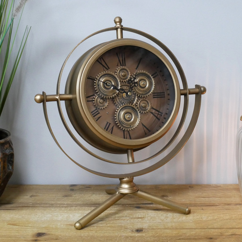 Small gold gyroscope working cog mantel clock
