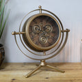 Small gold gyroscope working cog mantel clock