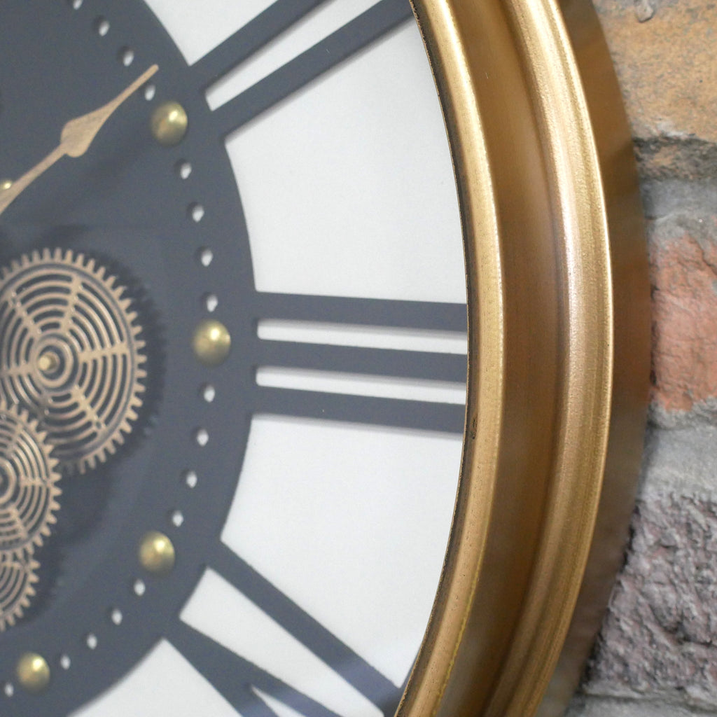 Gold frame working cog wall clock with cream and charcoal face