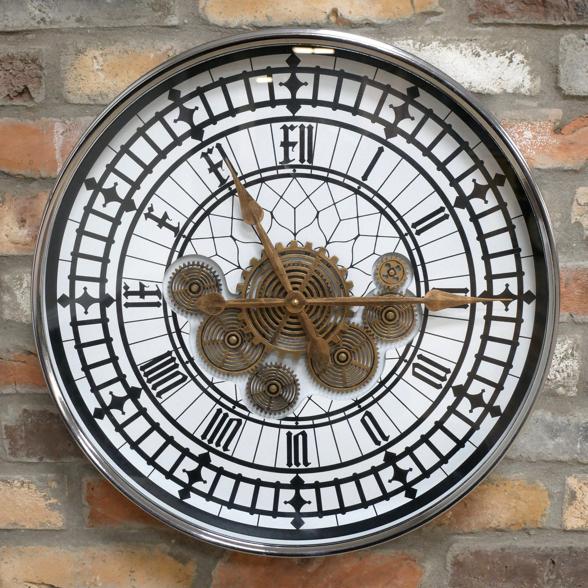 Tower skeleton working cog wall clock with silver frame