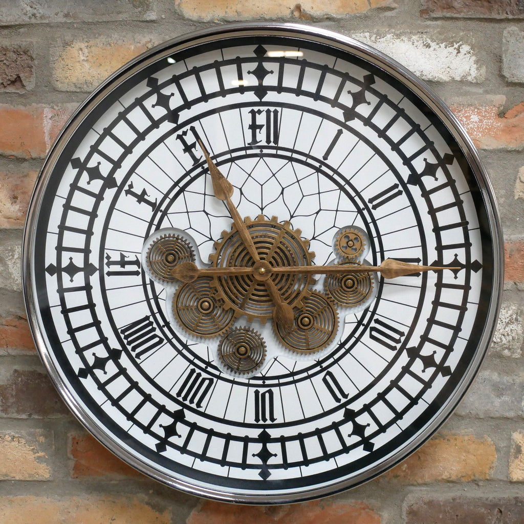 Tower skeleton working cog wall clock with silver frame