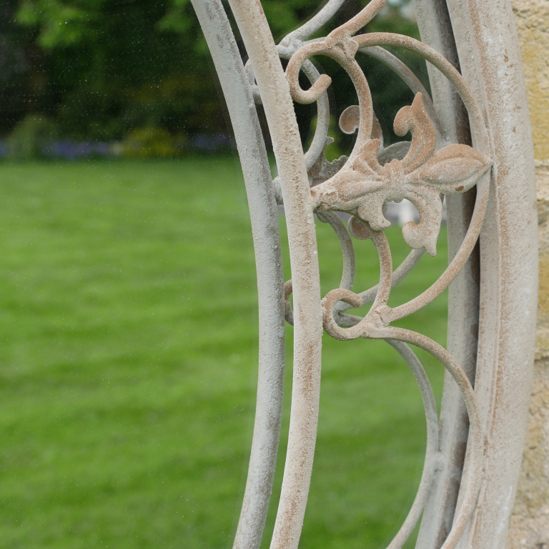 A Decorative Circular Garden Wall Mirror